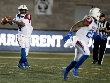 Montreal Alouettes quarterback Darian Durant, left, lines up to throw the ball to Montreal Alouettes running back Brandon Rutley during CFL action against the Winnipeg Blue Bombers at Molson Stadium in Montreal on Thursday August 24, 2017.
