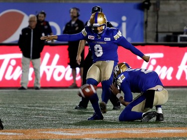 Winnipeg Blue Bombers defensive back Chris Randle kicks the game-winning field goal in overtime during CFL action against the Montreal Alouettes at Molson Stadium in Montreal on Thursday August 24, 2017.