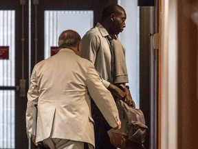 Irving Fosu, 23, enters the courtroom prior to sentencing at the Palais de Justice on Friday.