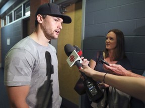 Montreal Canadiens Jonathan Drouin speaks to reporters prior to scrimmage with fellow NHL-ers represented by player agent Allan Walsh at the arena at Lower Canada College in Montreal Monday August 28, 2017.