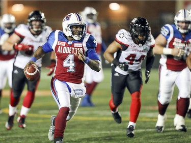 Montreal Alouettes quarterback Darian Durant runs for a first down against the Ottawa Redblacks during first half of Canadian Football League game in Montreal, Thursday August 31, 2017.