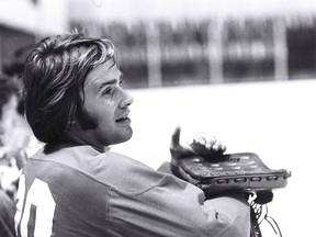 A boyish-looking Ken Dryden (#29) of the Montreal Canadiens looks on during practice at the Montreal Forum circa 1975 in Montreal.