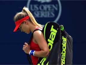 Canada's Eugenie Bouchard walks off the court after losing to Donna Vekic of Croatia during Day 4 of the Rogers Cup at Aviva Centre in Toronto.