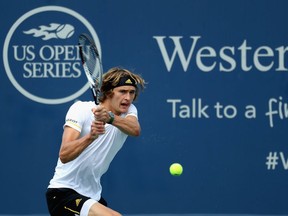 Alexander Zverev of Germany returns a shot to Frances Tiafoe during Day 5 of the Western & Southern Open at the Linder Family Tennis Center on August 16, 2017 in Mason, Ohio.