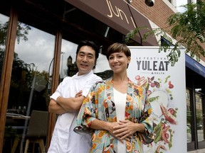 Chef Junichi Ikematsu, left, and sommelier Julie Audette pose outside his restaurant Jun I prior to taking part of the YUL Eat food festival in Montreal.