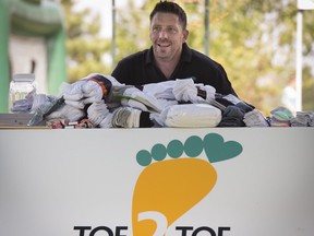 Chris Costello, founder of Toe2Toe, hopes to collect 25,000 pairs of socks over the next four months to distribute among Montreal's homeless population.