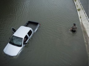 A submerged truck was abandoned near an underpass in Houston in the aftermath of Hurricane Harvey Aug. 28, 2017.