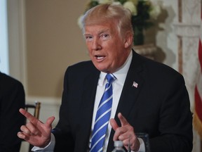 President Donald Trump gestures as he answers a question regarding the ongoing situation in North Korea, Friday, Aug. 11, 2017, at Trump National Golf Club in Bedminster, N.J.