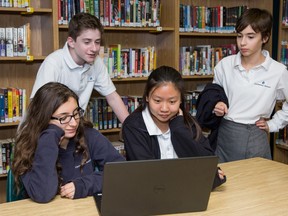 Centennial students at work in the school library.