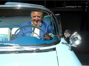 Lino Saputo in one of his many treasured collector cars, at his house in Senneville in 2010.