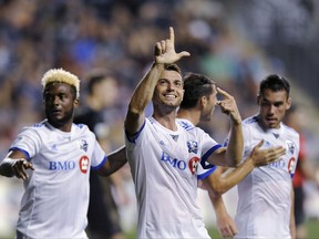 Montreal Impact's Blerim Dzemaili gestures to the crowd after scoring a goal during the second half of the team's MLS soccer match against the Philadelphia Union on Saturday, Aug. 12, 2017, in Chester, Pa.