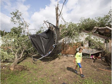 Emile Turcotte

Emile Turcotte walks through his backyard as his trampoline hangs from a tree as a result of a category one tornado, Wednesday, August 23, 2017 in Lachute, Que., northwest of Montreal.THE CANADIAN PRESS/Ryan Remiorz ORG XMIT: RYR110
Ryan Remiorz,