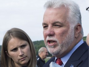 Premier Philippe Couillard says he is ready to open a “space for discussions” with Quebec municipalities regarding the implementation of the future religious-neutrality law.