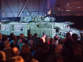 The new upgraded Light Armoured Vehicle is unveiled at a news conference at a General Dynamics facility in London, Ont., on January 24, 2012.
