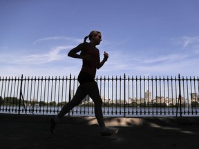 A woman jogs through Central Park in New York: Jogging may be good for you, but it's not for everybody, and there's much to be said for an evening walk, Natalie Turko-Slack writes.