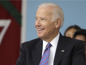 In this May 24, 2017, file photo, former Vice President Joe Biden listens while seated on the stage during 2017 Harvard College Class Day exercises at Harvard University  in Cambridge, Mass.  (AP Photo/Steven Senne)