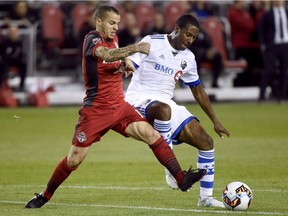 Toronto FC forward Sebastian Giovinco (10) and Montreal Impact midfielder Patrice Bernier (8) vie for control of the ball during second half Canadian Championship soccer action in Toronto on June 27, 2017. The growing rivalry between the Montreal Impact and Toronto FC enters a new phase on Sunday when they clash in their first of three regular season meetings in the next seven weeks. The Impact have a chance to slow down Toronto's march toward an MLS single season points record while TFC wouldn't mind putting Montreal's playoff chances in jeopardy. Round 1 is at Saputo Stadium, where Montreal has usually had the upper hand.