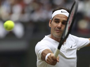 Switzerland's Roger Federer returns to Croatia's Marin Cilic during the Men's Singles final match on day thirteen at the Wimbledon Tennis Championships in London Sunday, July 16, 2017. World No. 3 Roger Federer confirmed Tuesday that he will play in the Rogers Cup next week in Montreal. It will be the Swiss star's first trip to Montreal since 2011.