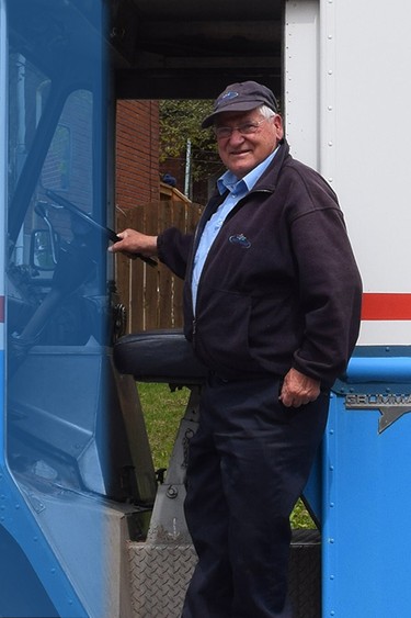 Milkman Arnaldo De Castris shows off his 30-year old truck. (Giordano Cescutti)