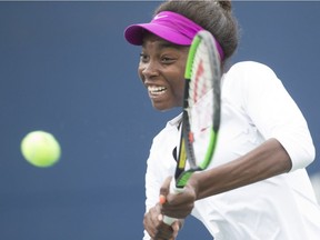 Montreal's Françoise Abanda  on the practice court at the Rogers Cup, in Toronto, Ont., on Aug. 7, 2017.