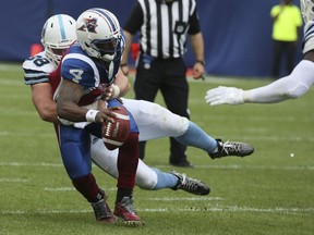 Montreal Alouettes quarterback Darian Durant (4) is sacked during CFL action in Toronto, Ont. on Saturday August 19, 2017. The Toronto Argonauts host the Montreal Alouettes at BMO field in Toronto.