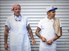 Chuck Hughes of Garde Manger and Danny Smiles of Le Bremner, chefs — and chefs d'orchestre — of the pop-up kitchen at Osheaga on July 30.