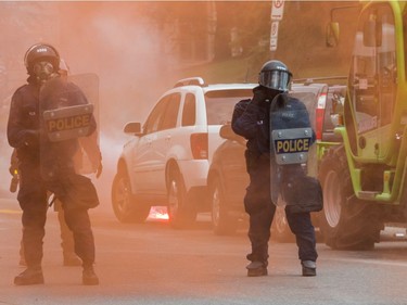 The far-right group La Meute and counter-protesters, organized by a group called Citizen Action Against Discrimination as well as the Ligue anti-fasciste Québec clashed in Quebec City, on Sunday, August 20, 2017. Police were on the receiving end of fireworks, smoke bombs and later, bottles and chairs.