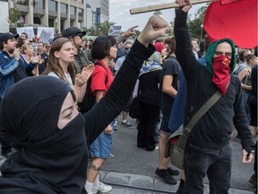 The far-right group La Meute and counter-protesters, organized by a group called Citizen Action Against Discrimination as well as the Ligue anti-fasciste Québec clashed in Quebec City, on Sunday, August 20, 2017. Police moved the counter-protesters through the streets declaring the demo illegal.