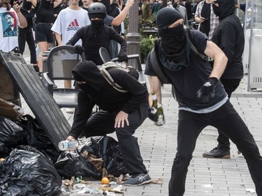 The far-right group La Meute and counter-protesters, organized by a group called Citizen Action Against Discrimination as well as the Ligue anti-fasciste Québec clashed in Quebec City, on Sunday, August 20, 2017. A group of masked demonstrators threw bottles and chairs at the police.
