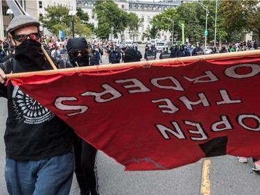 The far-right group La Meute and counter-protesters, organized by a group called Citizen Action Against Discrimination as well as the Ligue anti-fasciste Québec clashed in Quebec City, on Sunday, August 20, 2017. Police slowly moved the protesters through the streets.