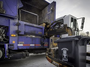A garbage bin is picked up by a Services Matrec truck in Beaconsfield last year.