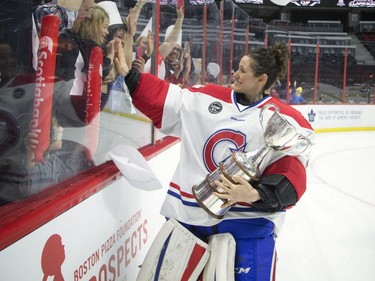 Charline Labonté of the Les Canadiennes de Montréal greats  her crew of fans in the crowd all wearing chef hats after the team won the 2017 Clarkson Cup at Canadian Tire Centre Sunday March 5, 2017.