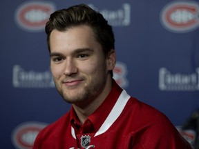 Newly acquired Montreal Canadiens forward Jonathan Drouin smiles at a press conference at the Bell Centre in Montreal, June 15, 2017.