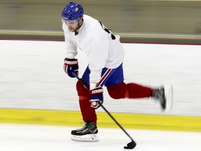 Montreal Canadiens' Jonathan Drouin shoots the puck during scrimmage with fellow NHL-ers represented by player agent Allan Walsh at the arena at Lower Canada College in Montreal Monday August 28, 2017.