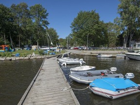 Small boats are tied up at the Canadian Forces Sailing Association base in Dorval on Saturday.