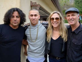 Guitarist Stevie Salas, far left, is an executive producer of Rumble: The Indians Who Rocked the World, and helped rally interview subjects for Montrealers Catherine Bainbridge and Alfonso Maiorana, far right. Artists who appear in the exploration of Indigenous influences on popular music include Black Eyed Peas rapper Taboo, second from left.