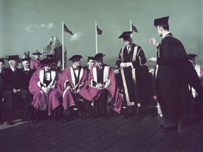 Governors of McGill University conferring on British Prime Minister Winston Churchill and U.S. President Franklin D. Roosevelt honourary doctorates of law, Citadel Hill, Quebec City, Sept. 16, 1944.