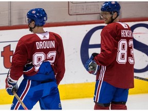 Montreal Canadiens newcomers Jonathan Drouin and Ales Hemsky chat during practice at the Bell Sports Complex in Brossard, on Tuesday, September 19, 2017.