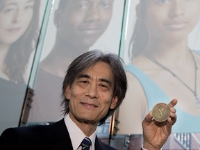 Kent Nagano receives the YMCA Peace Medal on Wednesday.