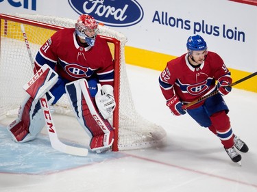 Montreal Canadiens left wing Jonathan Drouin, right, skates around Montreal Canadiens goalie Carey Price's net during pre-season NHL play against the Washington Capitals at the Bell Centre in Montreal on Wednesday September 20, 2017.