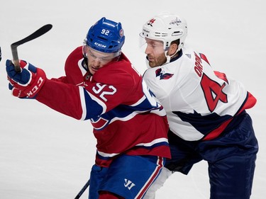 Montreal Canadiens left wing Jonathan Drouin gets hit by Washington Capitals defenceman Brooks Orpik during pre-season NHL play at the Bell Centre in Montreal on Wednesday September 20, 2017.