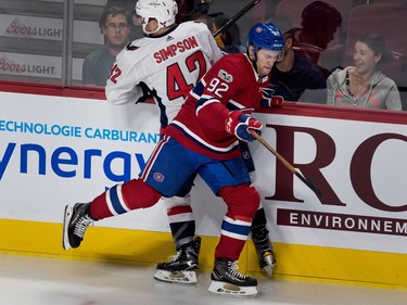 Montreal Canadiens left wing Jonathan Drouin hits Washington Capitals Wayne Simpson during pre-season NHL play at the Bell Centre in Montreal on Wednesday September 20, 2017.