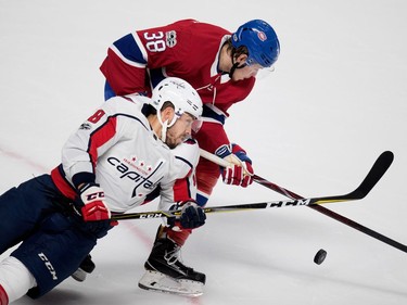 Washington Capitals centre Chandler Stephenson crashes on to Montreal Canadiens left wing Nikita Scherbak during pre-season NHL play at the Bell Centre in Montreal on Wednesday September 20, 2017.