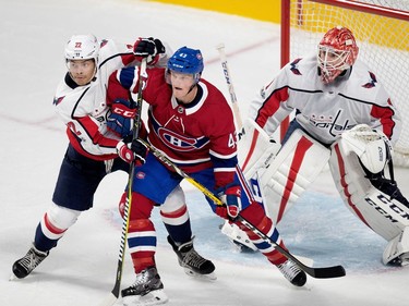 MONTREAL, QUE.: SEPTEMBER 20, 2017-- Washington Capitals Madison Bowey tries to clear Montreal Canadiens left wing Daniel Carr from Washington Capitals goalie Pheonix Copley's crease during preseason NHL play at the Bell Centre in Montreal on Wednesday September 20, 2017. (Allen McInnis / MONTREAL GAZETTE) ORG XMIT: 59390
Allen McInnis