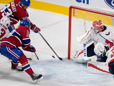 Montreal Canadiens right wing Ales Hemsky misses a rebound from Washington Capitals goalie Pheonix Copley during pre-season NHL play at the Bell Centre in Montreal on Wednesday September 20, 2017. Washington Capitals right wing Tom Wilson is held back by Montreal Canadiens defenceman Jakub Jerabek.
