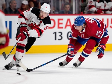 Montreal Canadiens left wing Jacob De La Rose tries to get to the puck ahead of New Jersey Devils left wing Taylor Hall during pre-season NHL action at the Bell Centre in Montreal on Thursday September 21, 2017.