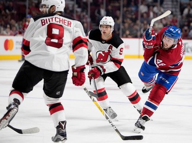Montreal Canadiens centre Daniel Audette's shot gets stopped by New Jersey Devils goalie Keith Kinkaid during pre-season NHL action at the Bell Centre in Montreal on Thursday September 21, 2017. New Jersey Devils defenceman Will Butcher and New Jersey Devils left wing Taylor Hall look on.