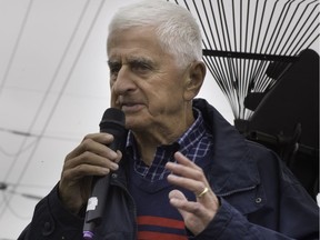 Dollard-des-Ormeaux Mayor Ed Janiszewski speaks in October 2016 to protesters who want Hydro-Québec to bury new power lines that will be installed between Sources and St-Jean boulevards.