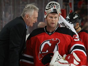 Former Canadiens great Larry Robinson, seen here with Martin Brodeur of the New Jersey Devils, will be joining the St. Louis Blues as a consultant.