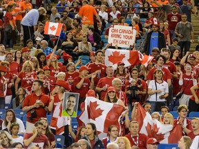 Fans enjoy the atmosphere during the 2015 FIFA Women's World Cup Group A match between Canada and the Netherlands at Olympic Stadium on June 15, 2015 in Montreal.